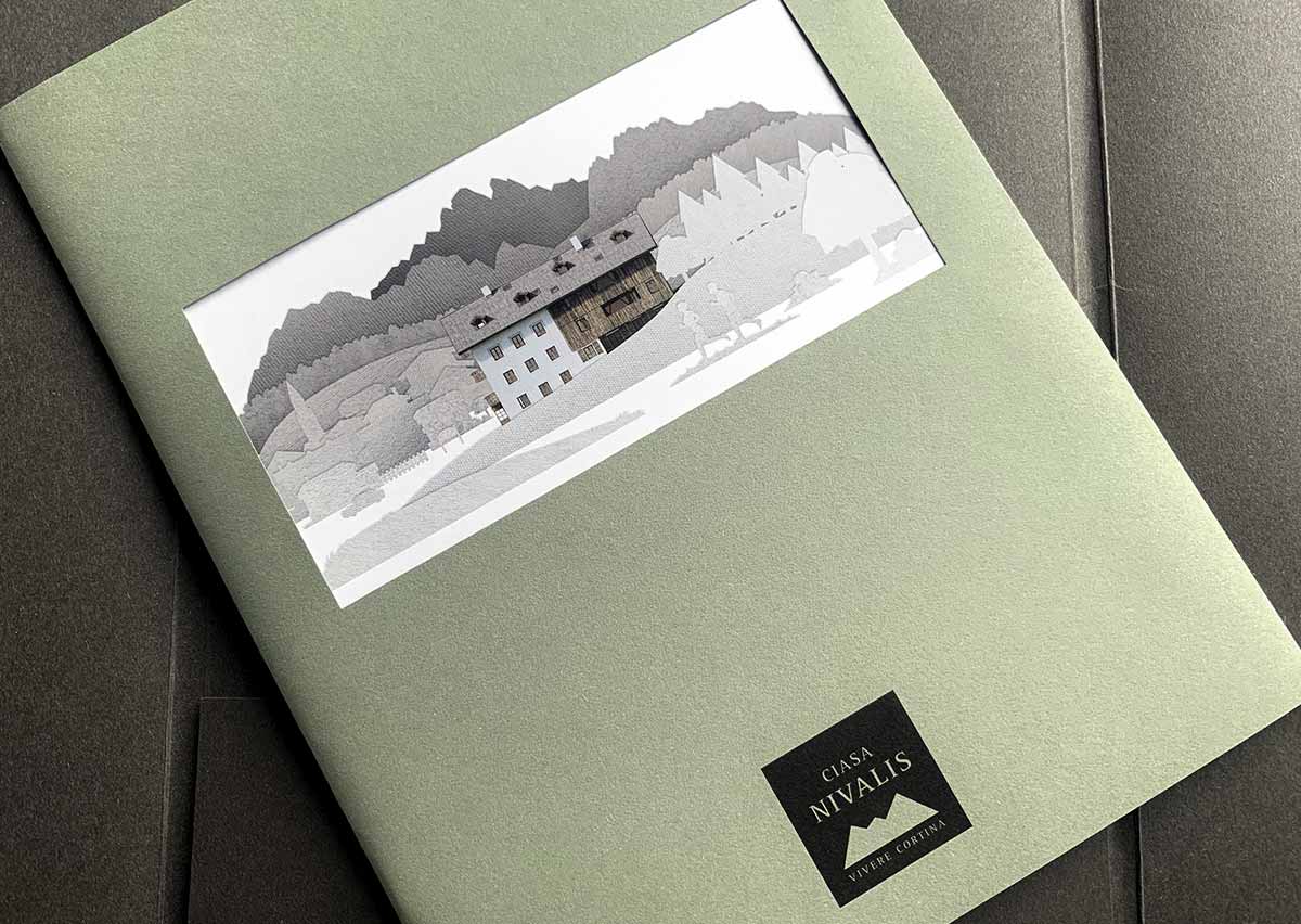 Catalogo immobiliare Ciasa Nivalis Cortina d’Ampezzo con sovracoperta e carte Fedrigoni