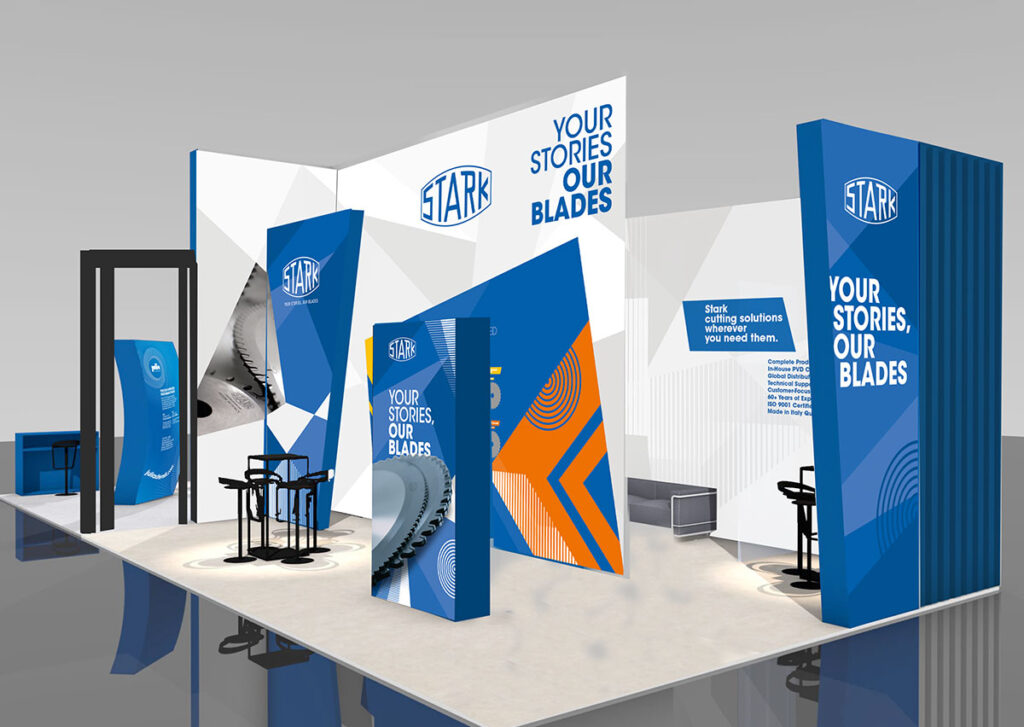 Stand fieristico aziendale Stark Udine con pareti grafiche blu e aree meeting